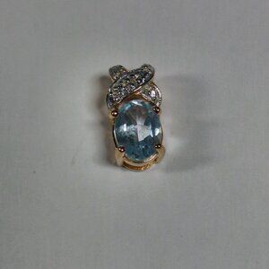 Gold-Plated Sterling Silver Blue Topaz Pendant With a Diamond Accent